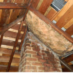 Deficiency: Missing counter-flashing around chimney. This condition will not adequately protect from water ingress.